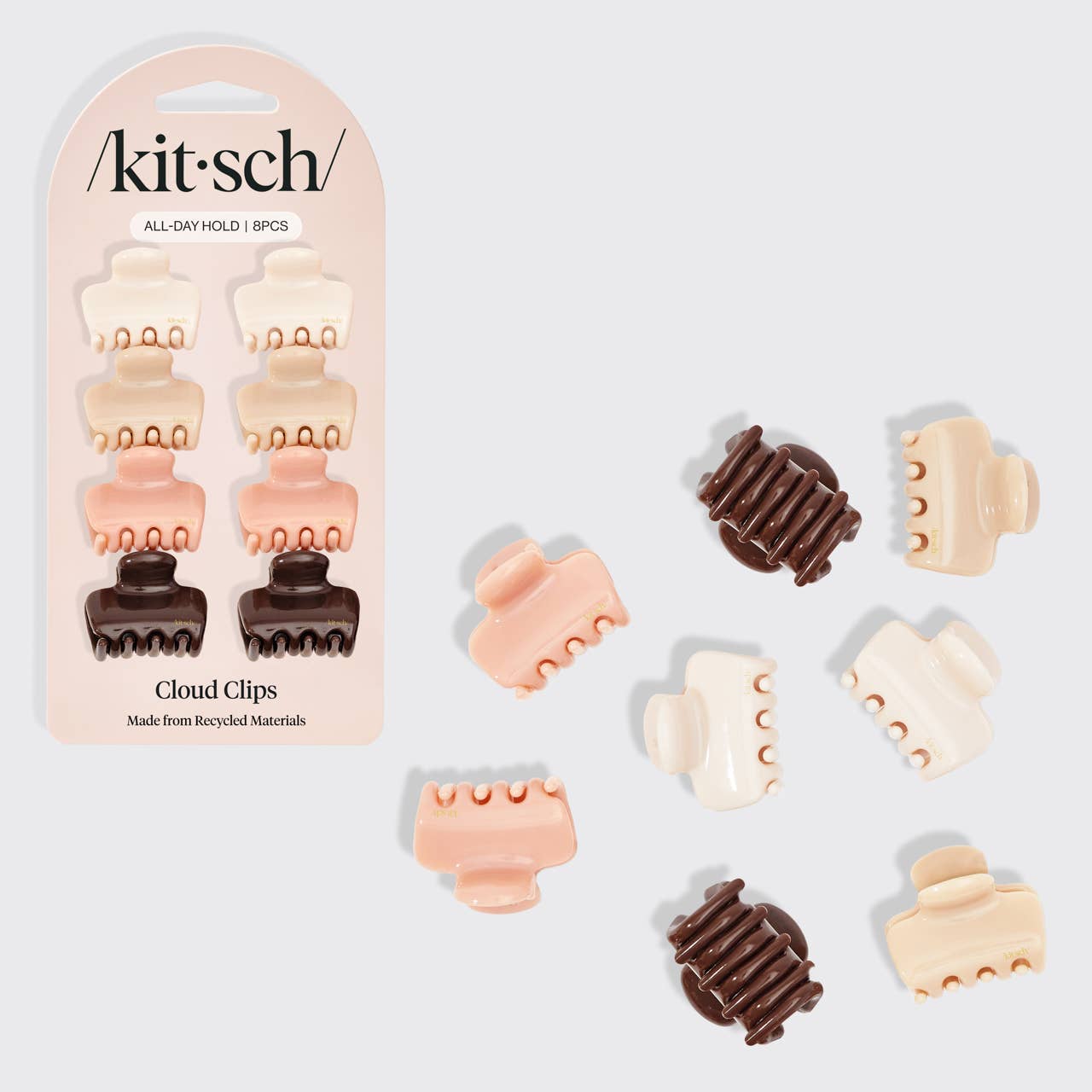 Set of cloud clips with packaging labeled 'kitsch' on a light gray background