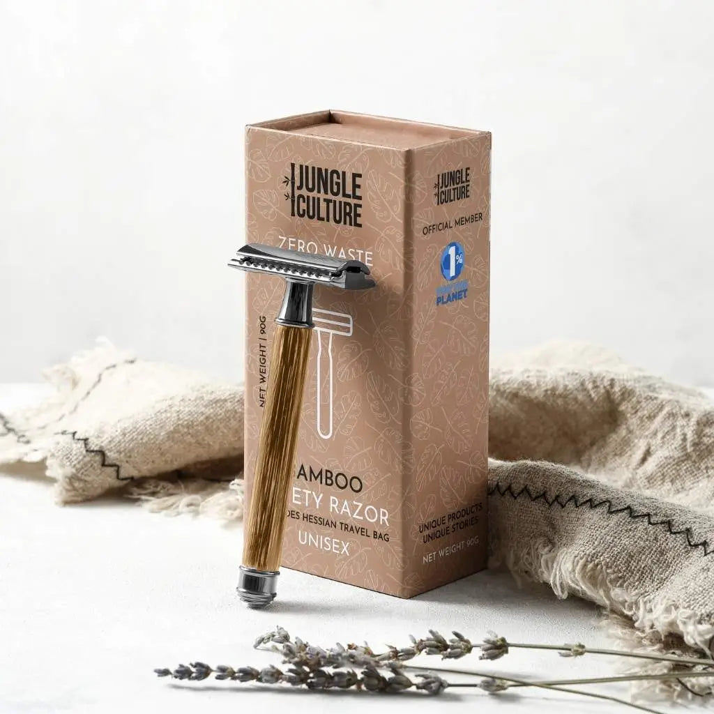 Bamboo safety razor with Jungle Culture packaging on a light background