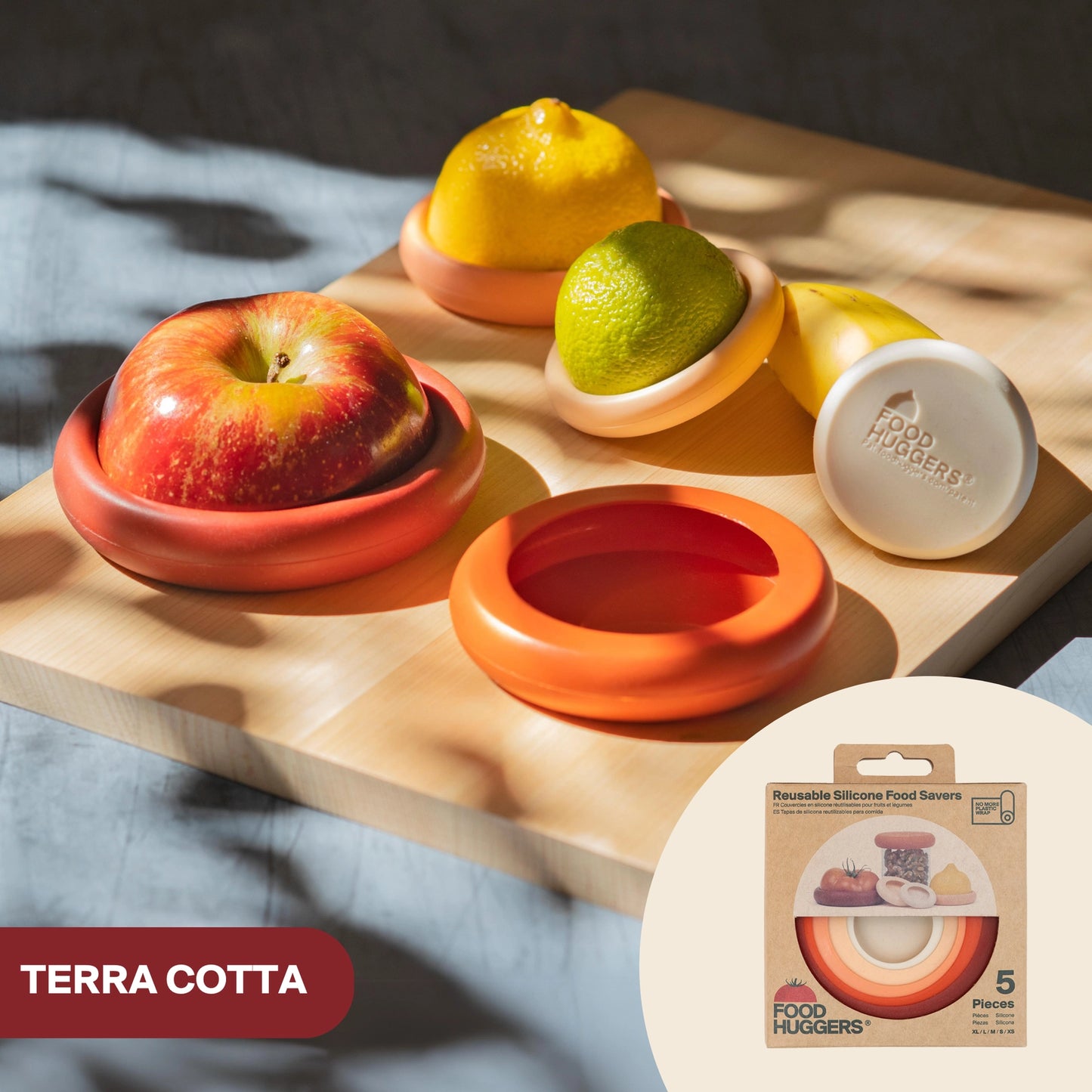 Silicone food covers in terracotta like colors. 