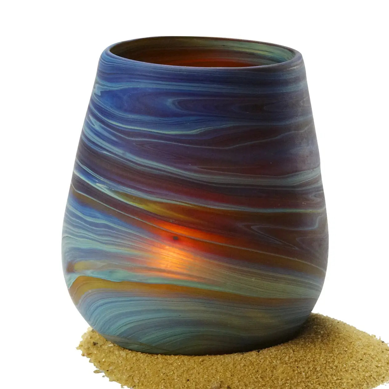 Glass blown multi color candle holder.