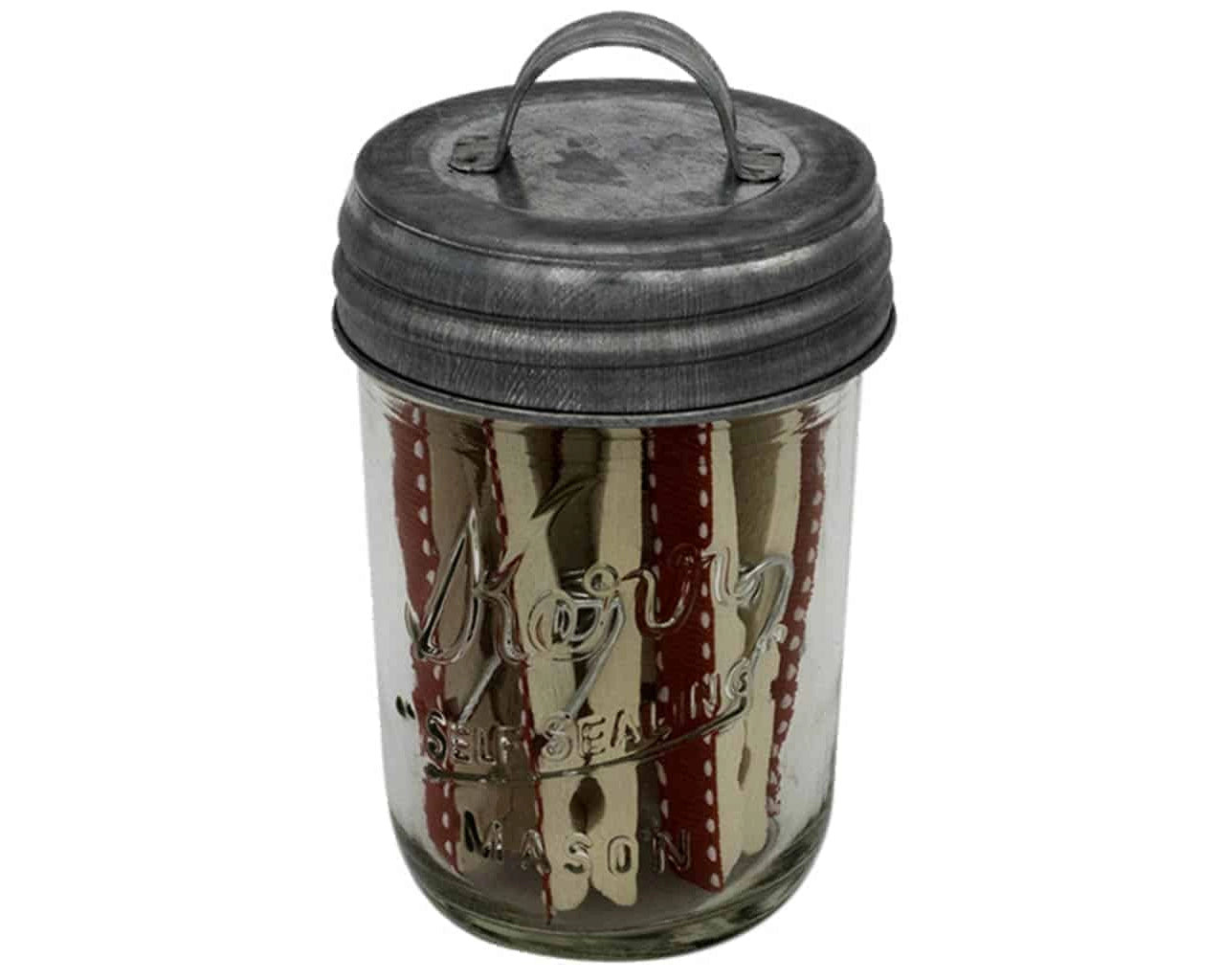 Glass mason jar with handled lid. 