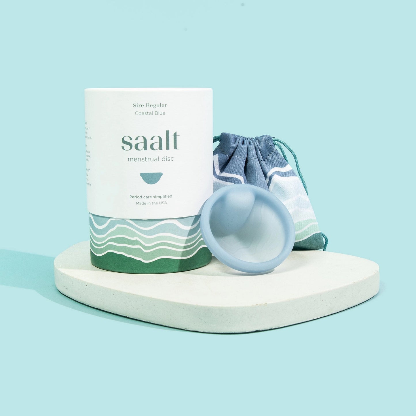 saalt menstrual disc packaging with a blue disc.