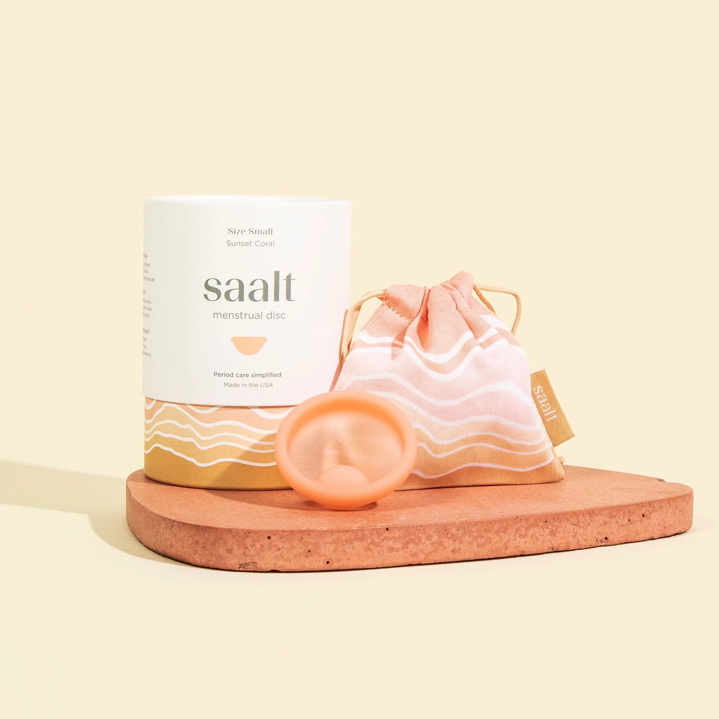 saalt coral color menstrual disc with packaging..