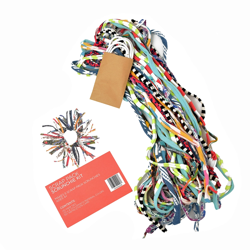 Colorful scrunchie pack with scrunchies and packaging.